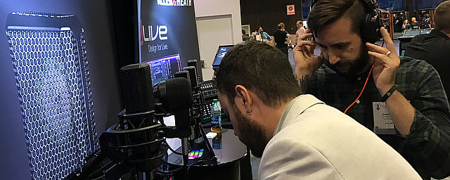 Jason La Rocca testing LCT 640 TS studio microphone at AES convention