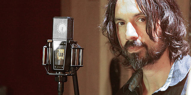 This image shows a sound engineer in studio with his LCT 940 Tube/FET microphone