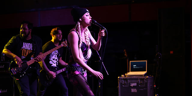 Christina Chriss of Kaleido with her go-to mic the MTP 550 DM live performance microphone