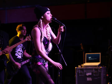 Christina Chriss of Kaleido with her go-to mic the MTP 550 DM live performance microphone