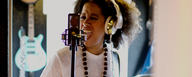 Picture shows Bibi McGill with her large-diaphragm condenser studio microphone LCT 550